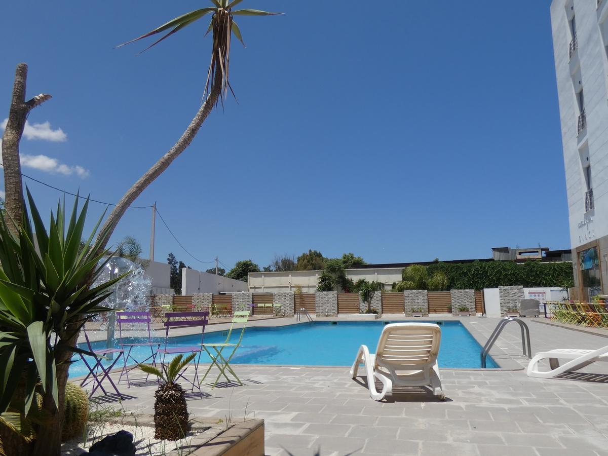 Le Zenith Hotel Orano Esterno foto